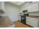 Modern kitchen with ample storage, countertops, and modern appliances at 945 N Pasadena -- # 84, Mesa, AZ 85201