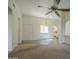 Bright living room featuring an open layout, neutral tones, and access to other rooms in the home at 945 N Pasadena -- # 84, Mesa, AZ 85201