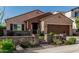 Charming single-story home featuring desert landscaping, a private courtyard, and an attached two-car garage at 1322 W Spur Dr, Phoenix, AZ 85085