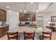 Beautiful kitchen features granite countertops, stainless steel appliances, and a large island at 1322 W Spur Dr, Phoenix, AZ 85085