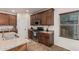 The kitchen features stainless steel appliances, granite countertops, and plenty of cabinet space at 1322 W Spur Dr, Phoenix, AZ 85085