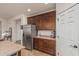 This kitchen features stainless steel appliances and plenty of counter and cabinet space at 1322 W Spur Dr, Phoenix, AZ 85085