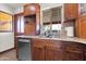 Kitchen with custom cabinets, stainless steel appliances, and a granite countertop at 2017 E Willis Rd, Gilbert, AZ 85297