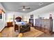 Traditional main bedroom with wood furniture, ceiling fan and patterned rug at 2017 E Willis Rd, Gilbert, AZ 85297