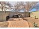 Patio space features seating, barbecue, and privacy fence for relaxing outdoors at 2017 E Willis Rd, Gilbert, AZ 85297