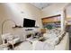 Spacious living room with high ceilings, wet bar, and comfortable seating, perfect for entertaining guests at 2408 W Crimson Ter, Phoenix, AZ 85085