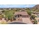 An aerial image shows the front exterior surrounded by desert landscaping, mountains, and a private driveway at 3060 N Ridgecrest -- # 200, Mesa, AZ 85207