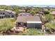 Beautiful aerial view of the private backyard with a pool, patio, and desert landscaping at 3060 N Ridgecrest -- # 200, Mesa, AZ 85207