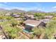 Scenic aerial view of the property with a pool, nestled in a serene neighborhood surrounded by beautiful mountain scenery at 3060 N Ridgecrest -- # 200, Mesa, AZ 85207