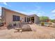 The luxurious backyard features a covered patio, pool, desert landscaping, and lounge chairs at 3060 N Ridgecrest -- # 200, Mesa, AZ 85207