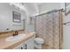 Cozy bathroom features a sink, vanity, mirror, toilet and shower at 3060 N Ridgecrest -- # 200, Mesa, AZ 85207