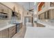 Modern kitchen featuring ample cabinetry, stainless steel appliances, and expansive countertops at 3060 N Ridgecrest -- # 200, Mesa, AZ 85207