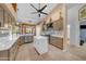 Bright and modern kitchen with custom cabinets, stainless appliances, and stylish backsplash at 3060 N Ridgecrest -- # 200, Mesa, AZ 85207