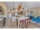 Open kitchen design with a center island, sleek countertops, and modern stainless steel appliances at 3060 N Ridgecrest -- # 200, Mesa, AZ 85207