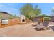 The beautiful patio features a built-in fireplace, grill, and lounge chairs, perfect for entertaining at 3060 N Ridgecrest -- # 200, Mesa, AZ 85207