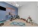 Well-equipped workout room featuring stationary bike, free weights, yoga mat, and ample space at 3060 N Ridgecrest -- # 200, Mesa, AZ 85207