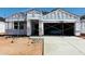 New construction home showcases scaffolding around the exterior, set to be completed soon at 5086 E Midnight Star Dr, San Tan Valley, AZ 85143
