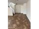 Entryway with tile flooring, staircase, and neutral paint at 11918 W Aster Dr, El Mirage, AZ 85335