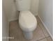 Bathroom featuring a white toilet at 11918 W Aster Dr, El Mirage, AZ 85335