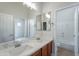 This bathroom features dual sinks, a large mirror, and access to the shower at 2620 W Piedmont Rd, Phoenix, AZ 85041