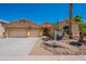 Charming single-story home featuring a well-manicured desert landscape and a spacious three-car garage at 2620 W Piedmont Rd, Phoenix, AZ 85041