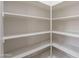 Walk-in pantry with white shelves providing ample storage space at 2620 W Piedmont Rd, Phoenix, AZ 85041