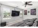 Spacious bedroom with a large window offering natural light and a ceiling fan at 2640 N Heritage St, Buckeye, AZ 85396