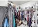 Walk-in closet filled with clothes and boxes for ample storage space at 2640 N Heritage St, Buckeye, AZ 85396