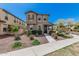 Charming two-story home with manicured landscaping and a welcoming entrance at 2640 N Heritage St, Buckeye, AZ 85396