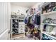 Organized walk-in closet with shelves and clothing racks offers ample storage solutions at 2640 N Heritage St, Buckeye, AZ 85396