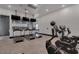 Community fitness center featuring treadmills, stationary bikes, and free weights for resident workouts at 4060 E French Trotter St, San Tan Valley, AZ 85140