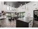 Clubhouse kitchenette with island and dining area for residents at 4060 E French Trotter St, San Tan Valley, AZ 85140