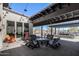 Outdoor patio with lounge chairs, grill, and string lights at 4060 E French Trotter St, San Tan Valley, AZ 85140