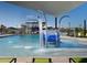 Resort-style community pool with water features, lounge seating, and shade at 4060 E French Trotter St, San Tan Valley, AZ 85140