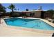 Beautiful backyard pool with patio furniture and desert landscaping at 534 E Pebble Beach Dr, Tempe, AZ 85282