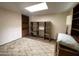 Bright room features built-in shelving, overhead lighting and neutral walls at 534 E Pebble Beach Dr, Tempe, AZ 85282