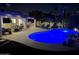 Stunning backyard with a pool, patio, and outdoor kitchen area, perfect for entertaining at 8332 E San Simon Dr, Scottsdale, AZ 85258