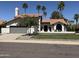 Charming single-Gathering home featuring a desert landscape, tile roof, and a private front patio for relaxing at 10266 E Caron St, Scottsdale, AZ 85258