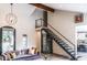 Modern living room with an open staircase, contemporary decor, and stylish accents at 10266 E Caron St, Scottsdale, AZ 85258
