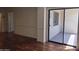 Sliding glass doors leading to a private patio with neutral colors and privacy at 10330 W Thunderbird Blvd # C-228, Sun City, AZ 85351