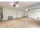 Garage with white walls and lighting at 10775 N 101St St, Scottsdale, AZ 85260