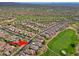 Stunning aerial view of home nestled in golf course community with mountain views in the background at 32868 N 69Th St, Scottsdale, AZ 85266