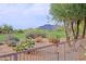 Beautiful backyard view showcasing desert landscape and a mountain backdrop at 32868 N 69Th St, Scottsdale, AZ 85266