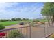 Scenic backyard view featuring lush greenery and a well-maintained golf course at 32868 N 69Th St, Scottsdale, AZ 85266