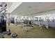 Well-equipped gym with a variety of weight machines and benches, enhanced by mirrored walls at 32868 N 69Th St, Scottsdale, AZ 85266