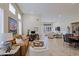 Expansive living room featuring herringbone floors and modern furnishings at 32868 N 69Th St, Scottsdale, AZ 85266