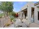 Inviting patio with outdoor seating, lush landscaping, and scenic views at 32868 N 69Th St, Scottsdale, AZ 85266