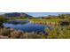 Scenic pond on the golf course with mountain views at 32868 N 69Th St, Scottsdale, AZ 85266