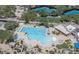 Aerial view of the community pool, tennis courts, and meticulously landscaped grounds at 32868 N 69Th St, Scottsdale, AZ 85266