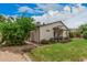 Well-maintained backyard with a covered patio, a storage shed, and plenty of green space at 6726 N 11Th St, Phoenix, AZ 85014